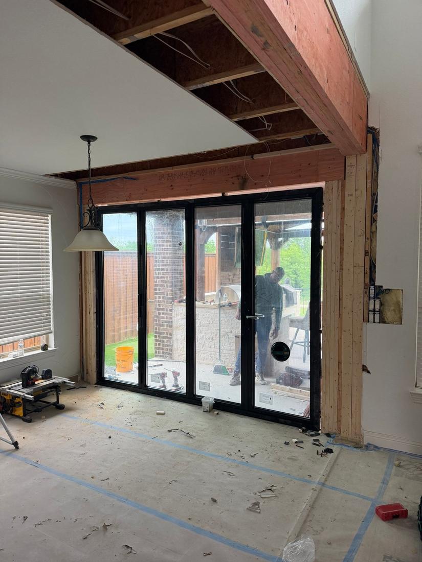 Custom bifold door installed in new framed opening, interior view